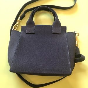 Rothy’s royal blue mini handbag